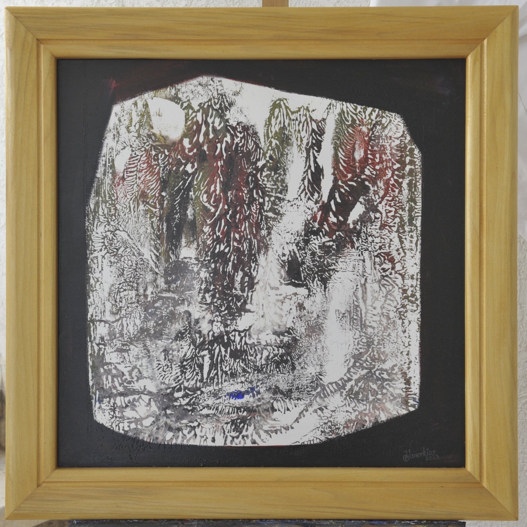 Abstract painting with a pale branching central form edged in black, in brown, white and grey tones, in a wooden frame