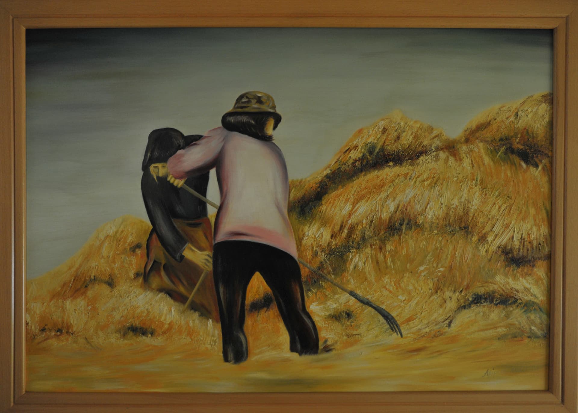 Painting of two field workers with rakes gathering golden haystacks under a muted grey sky, in a wooden frame