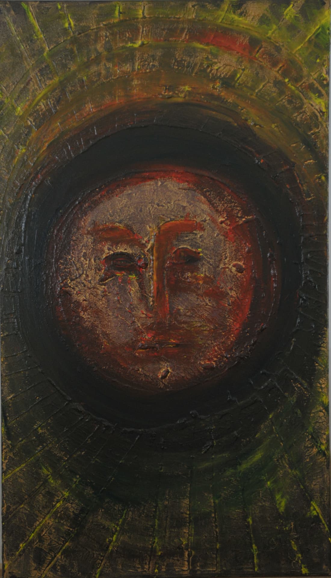 Weathered red and brown face set within dark concentric rings and radiating scored lines over splashes of yellow-green, on canvas