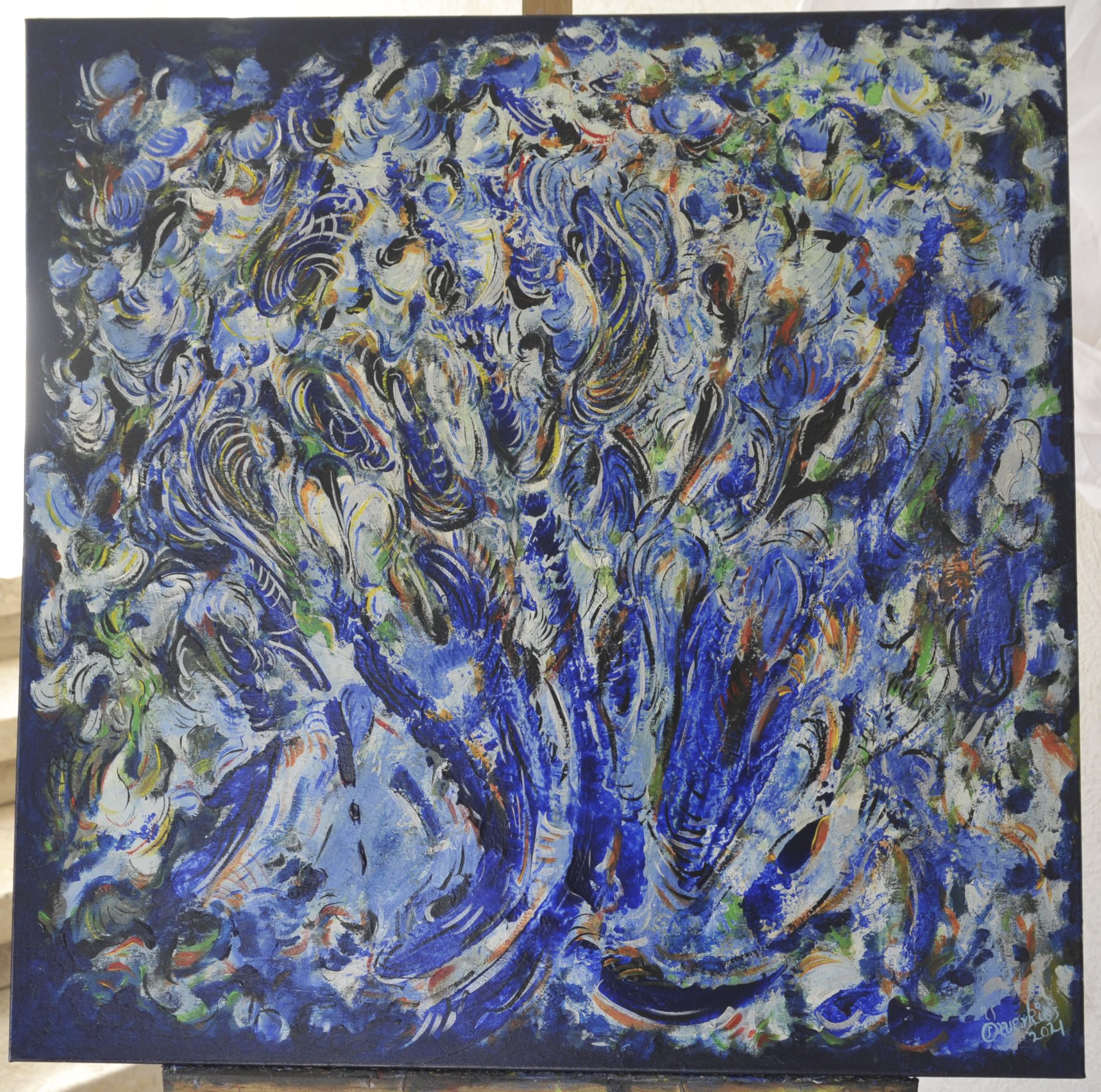 Square-format abstract painting with dense swirling curvilinear strokes radiating outward in deep blue, light blue and white