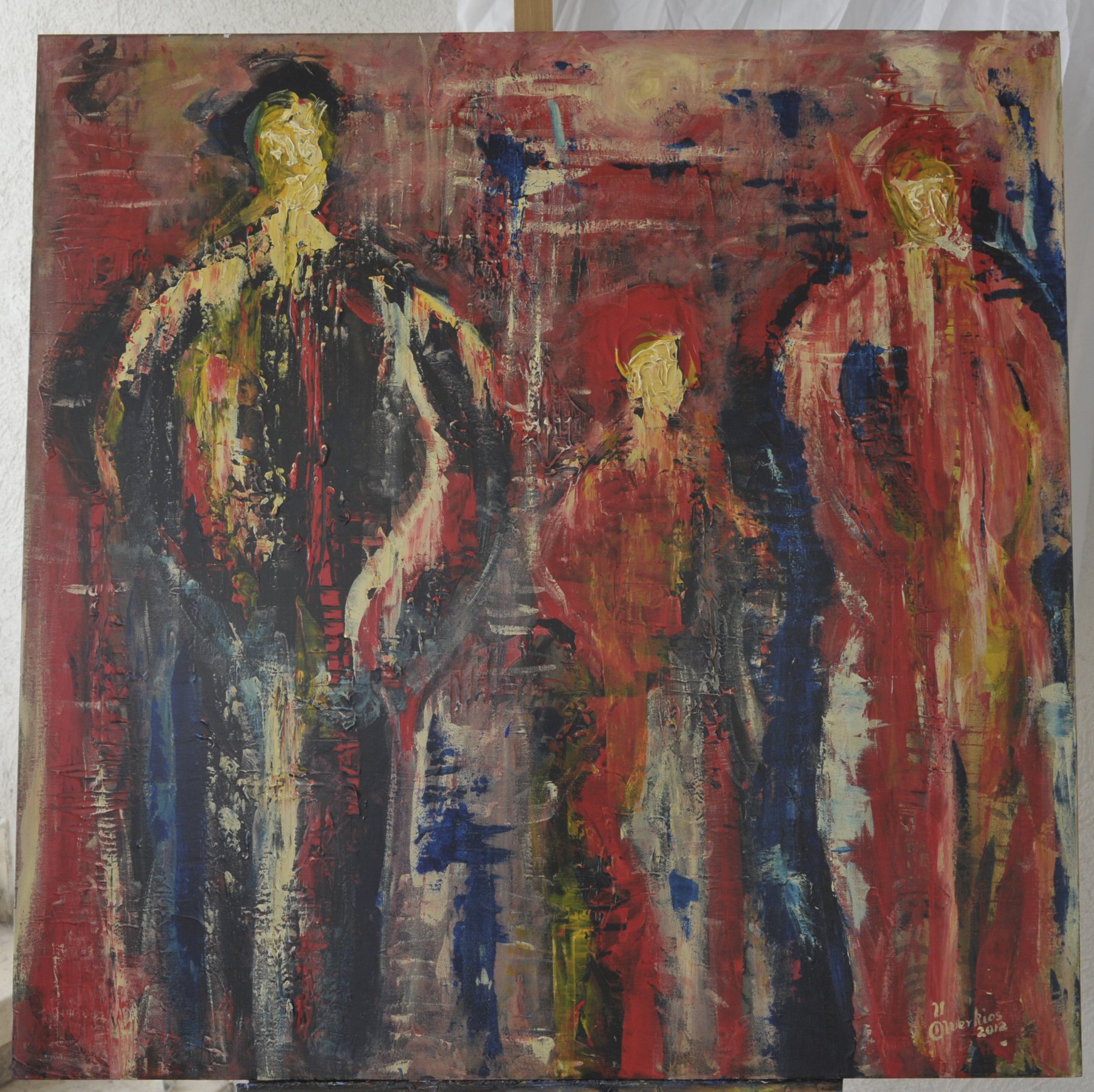 Painting of three stylized standing figures rendered in heavy brushwork of red, black, dark blue and cream