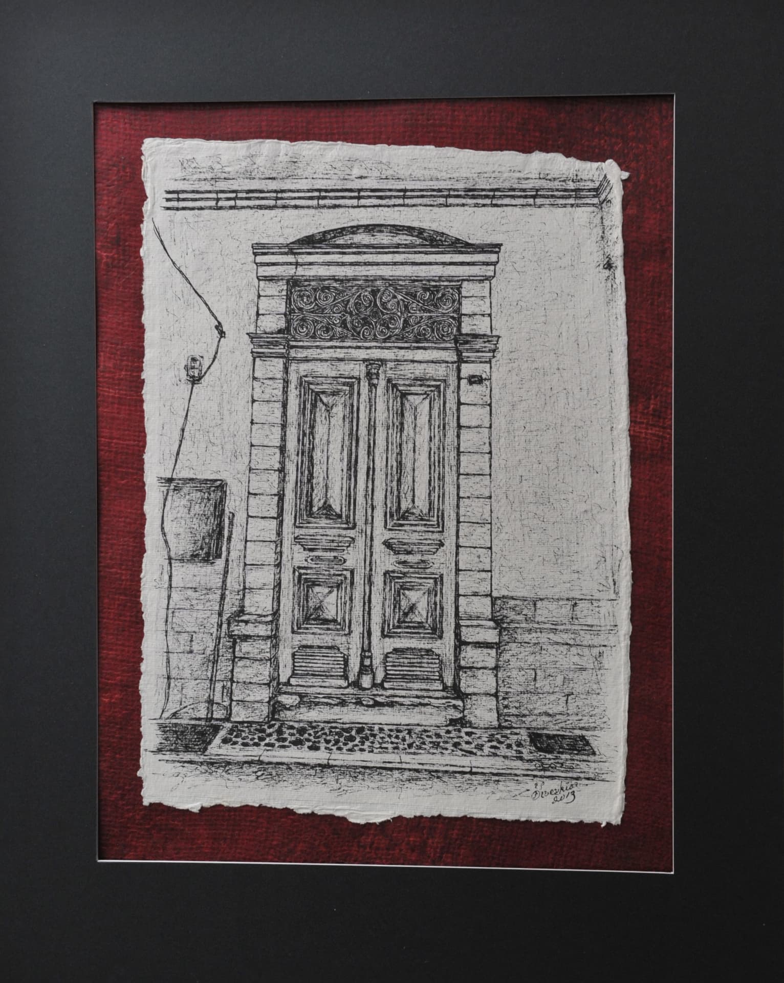 Ink drawing of a tall panelled double door flanked by stone pilasters beneath an ornate transom grill, on paper mounted on a deep red mat