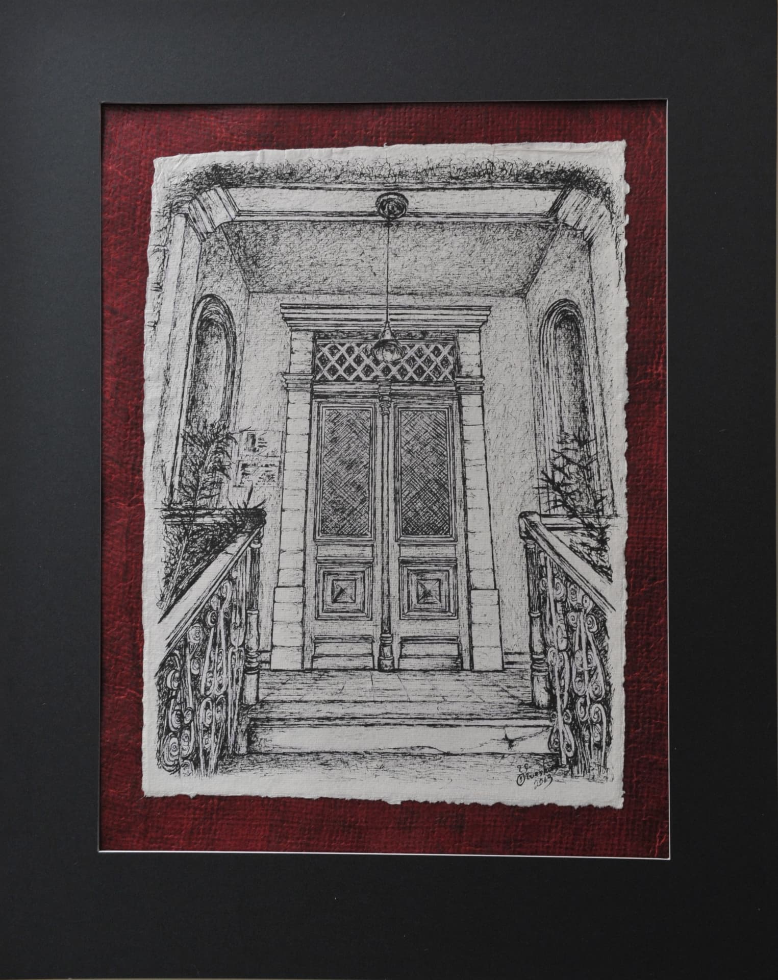 Ink drawing of an entrance porch with stone steps and railings leading to panelled double doors beneath a hanging light, on paper mounted on a deep red mat