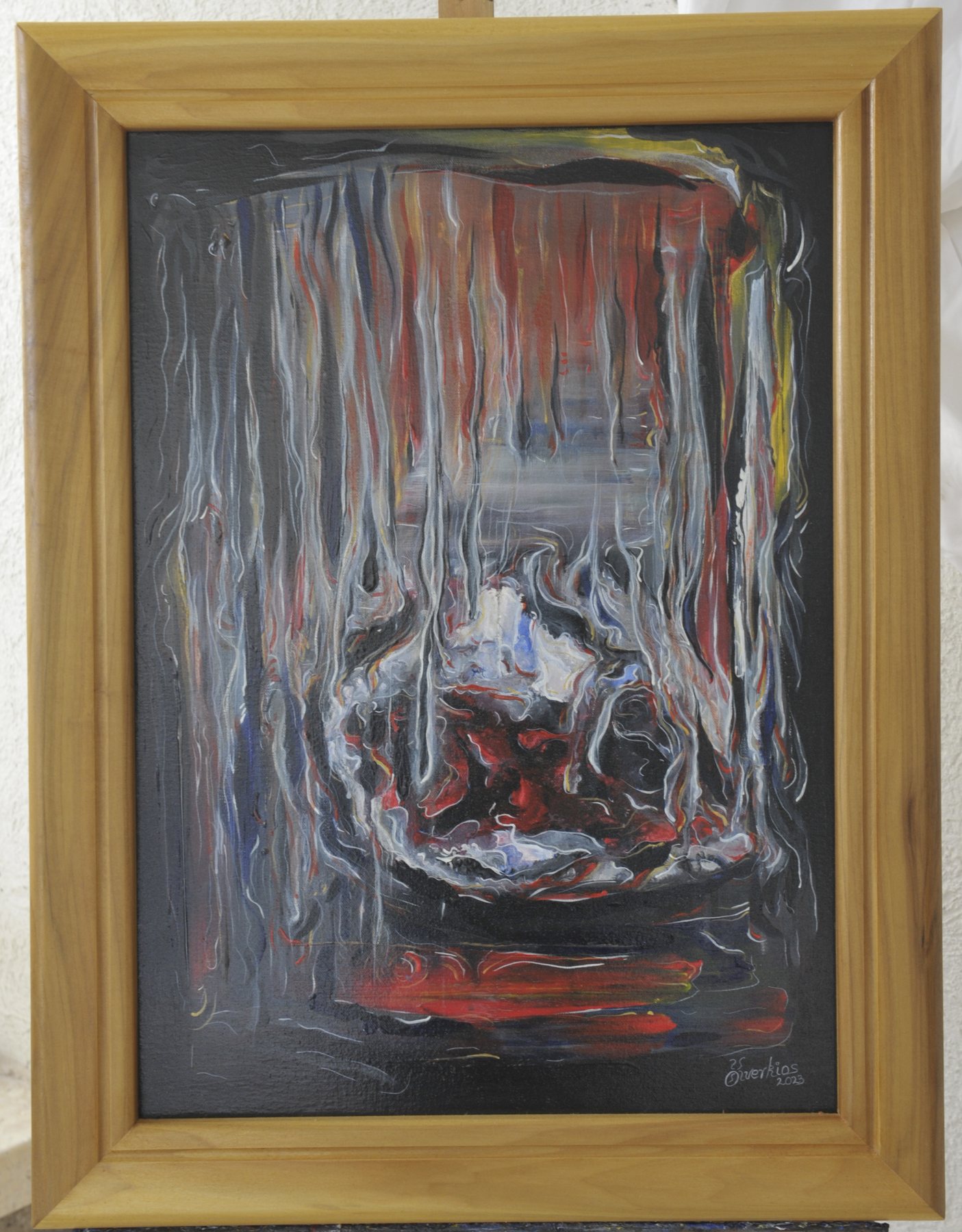 Painting with vertical grey and red strokes and a pale central form, in a wooden frame