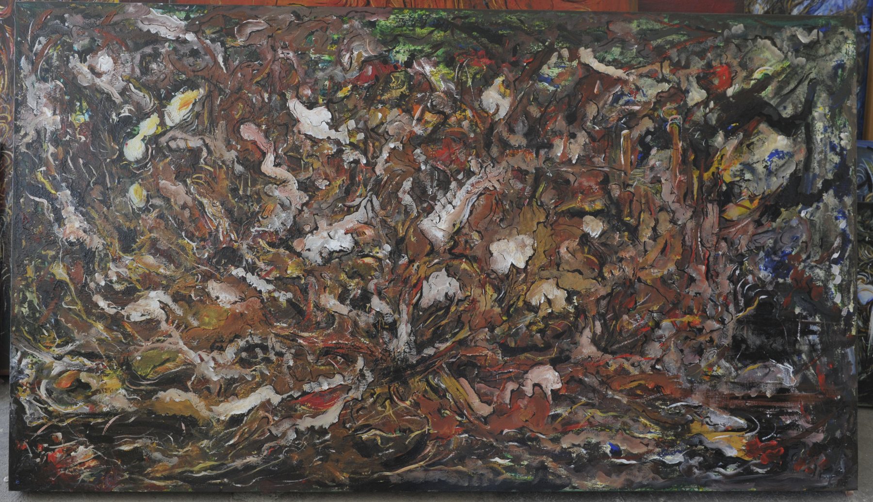 Landscape-format abstract painting of dense mottled brushstrokes in brown, black, beige and muted red