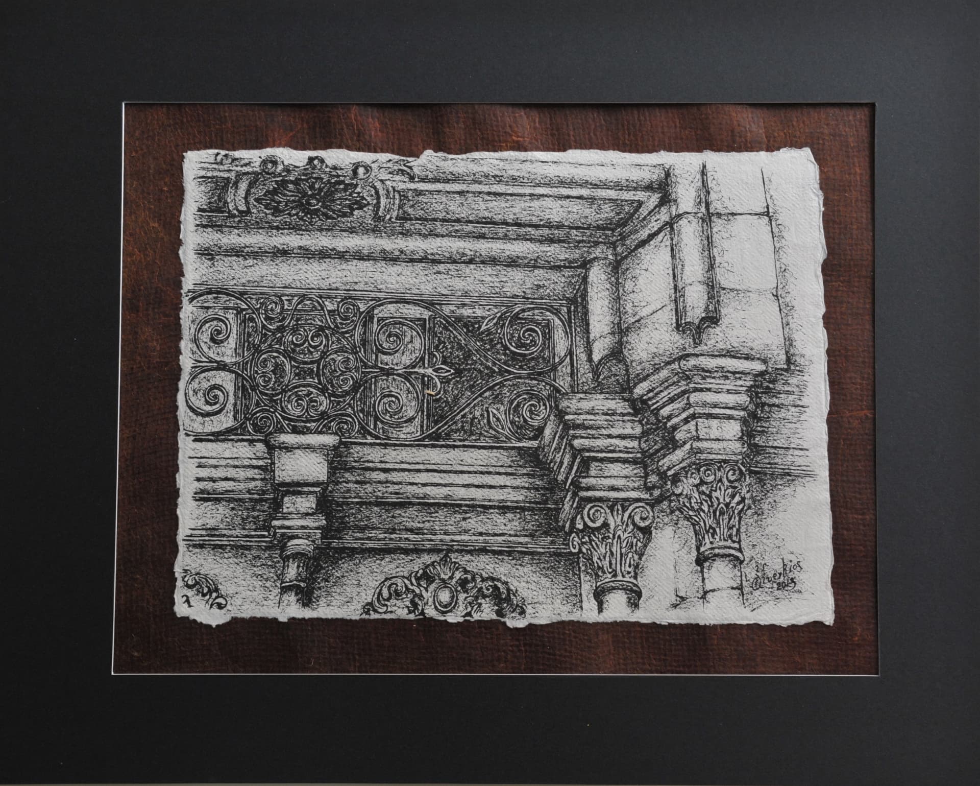 Landscape-format ink drawing of classical stone columns with carved capitals, decorative cornices and scrolled ironwork, on paper mounted on a reddish-brown mat